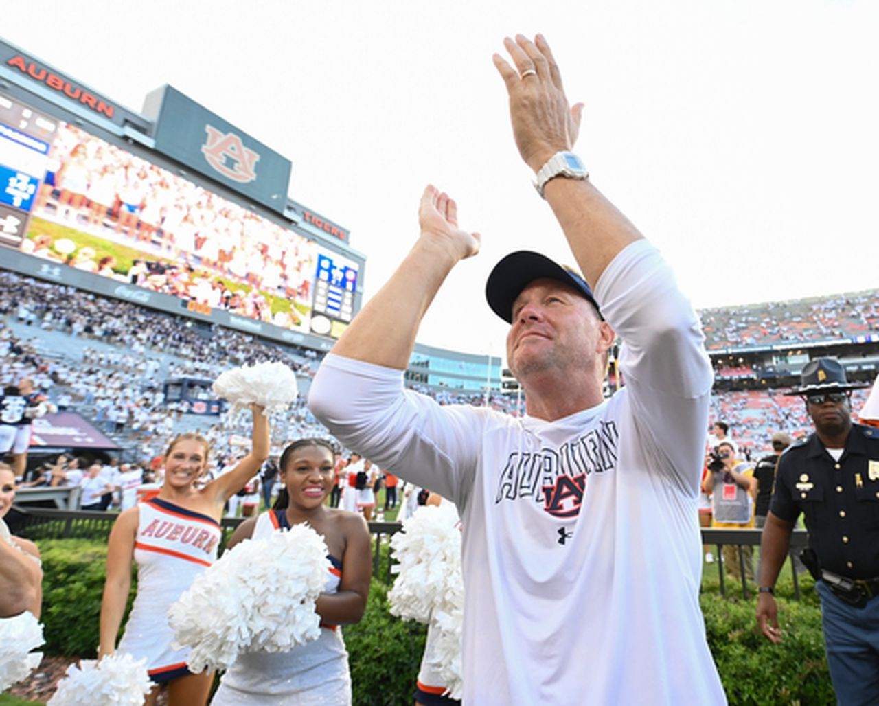 Watch as Auburn's Hugh Freeze helps baptize freshman safety Sylvester Smith