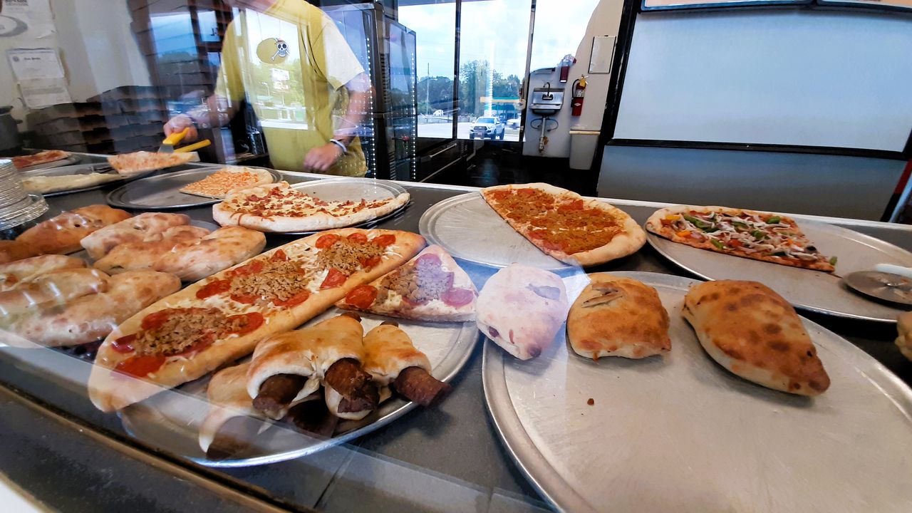 $7 for two slices and a 20-ounce soda is a pretty sweet deal.