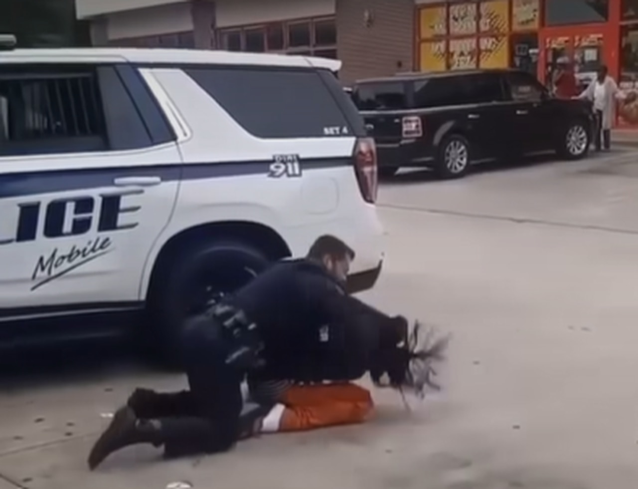 Mobile officer placed on leave after video shows him beating handcuffed man during arrest