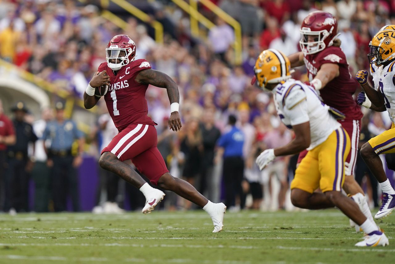Arkansas quarterback KJ Jefferson carries the football during an SEC game against LSU