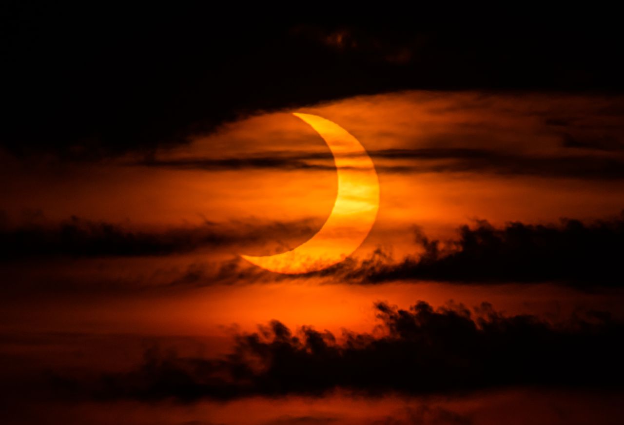 What time can I see the solar eclipse on Saturday?