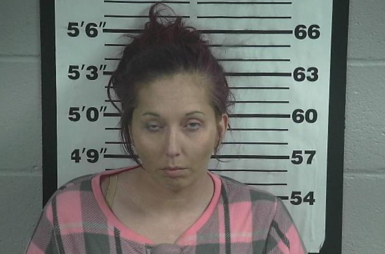 33-year-old woman is 3rd suspect charged in death of man found in burning Cullman County home