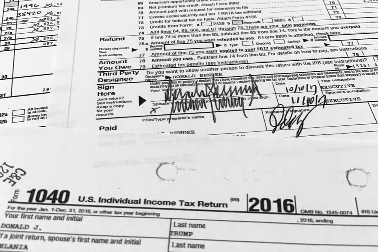 Signatures of former President Donald Trump and former first lady Melania Trump appear on their individual tax returns for 2016.