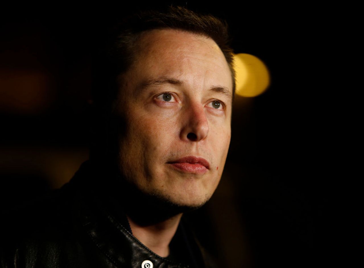 Tesla CEO Elon Musk talks to the media about the condition of the factory workers who were injured at the Tesla plant earlier in the day, outside of Santa Clara Valley Medical Center in San Jose, Calif. on Wednesday, Nov. 13, 2013. (Nhat V. Meyer/Bay Are