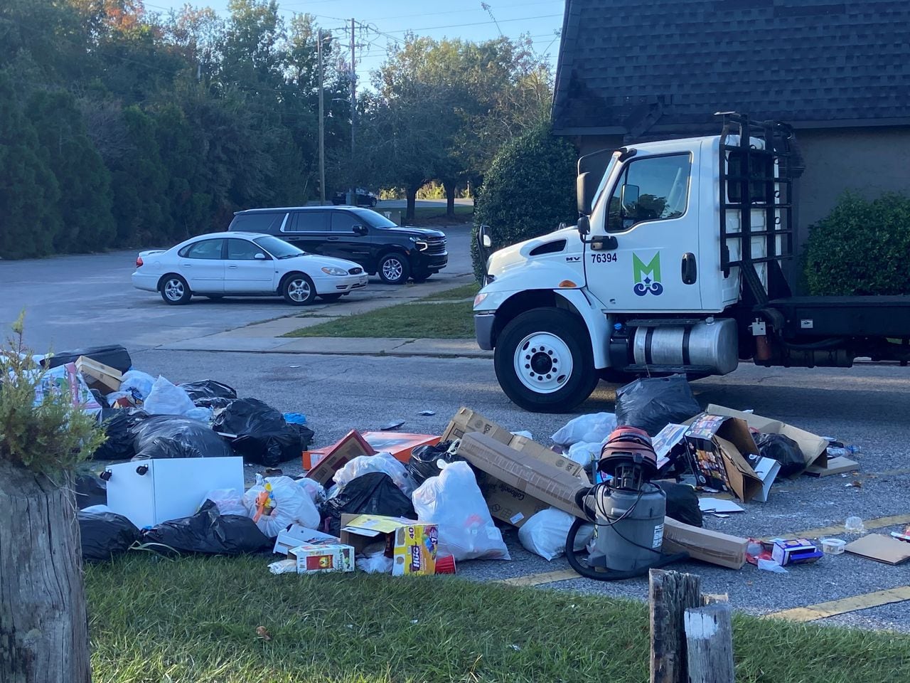 Garbage piles up at one apartment complex, while city of Mobile cleans another