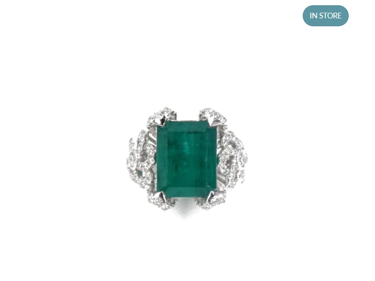 Platinum emerald and diamond ring