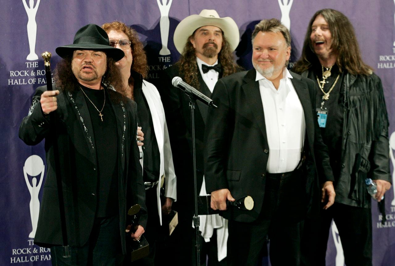 Members of Lynyrd Skynyrd in a 2006 file photo -- Gary Rossington, Billy Powell, Artimus Pyle, Ed King and Bob Burns --backstage after being inducted at the annual Rock and Roll Hall of Fame dinner in New York. King, who helped write several of their hits including “Sweet Home Alabama,” died from cancer, Wednesday, Aug. 22, 2018, in Nashville, Tenn. He was 68.