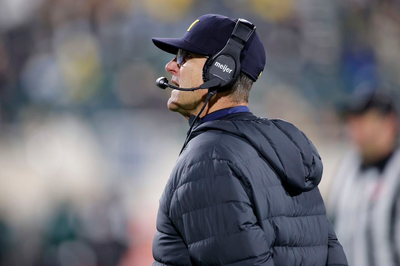 Michigan drops appeal, Harbaugh will serve full suspension