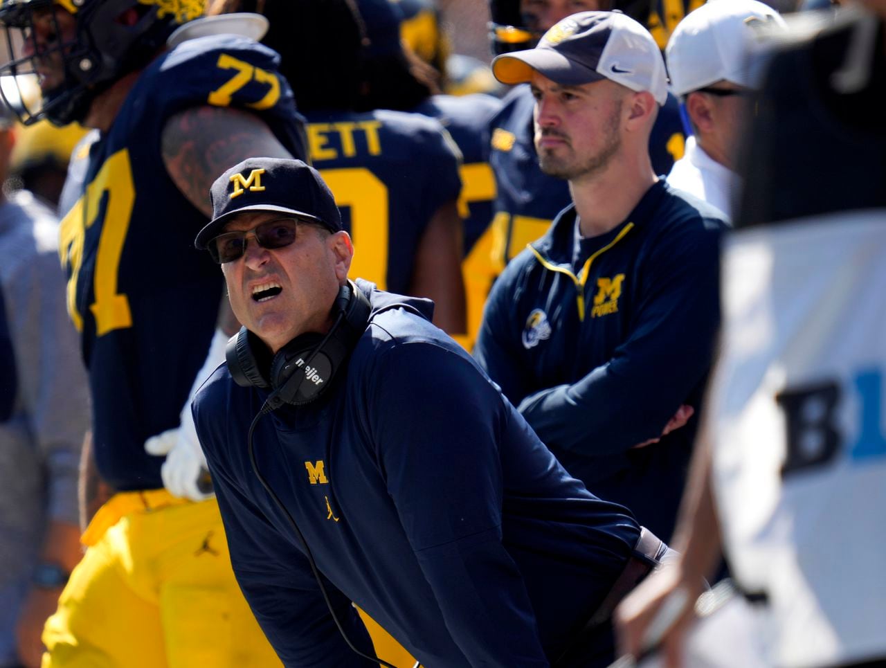 Michiganâs Jim Harbaugh wonât coach today against Penn State; Hearing set for No. 17