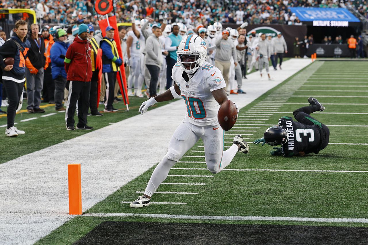 Miami Dolphins wide receiver Tyreek Hill scores a touchdown