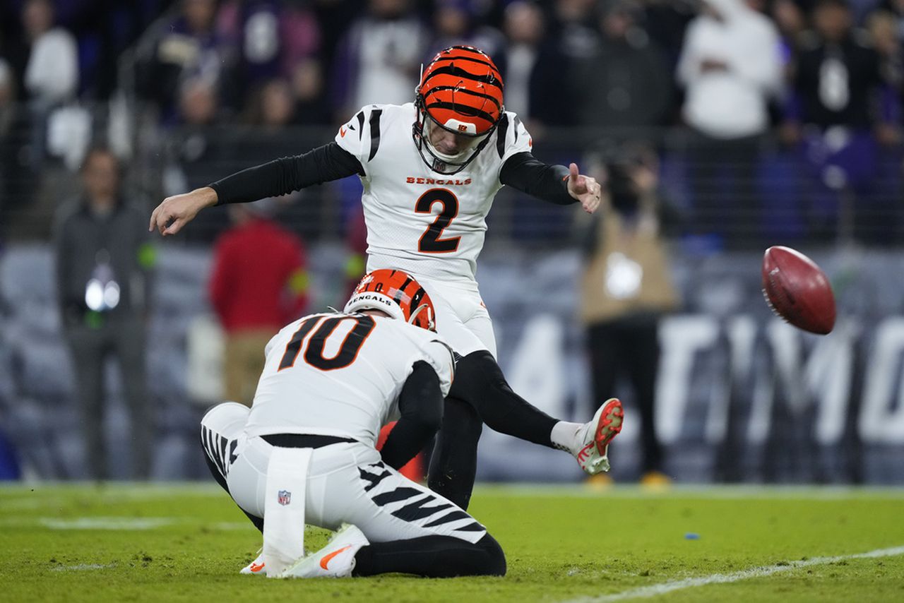 Evan McPherson kicks a field goal for the Cincinnati Bengals during an NFL game against the Baltimore Ravens