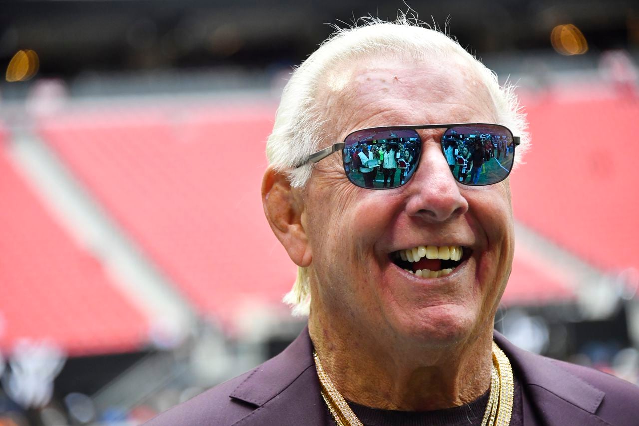 Ric Flair calls out ânon-athletic SEC journalistâ Finebaum, who claps back, over Jim Harbaugh