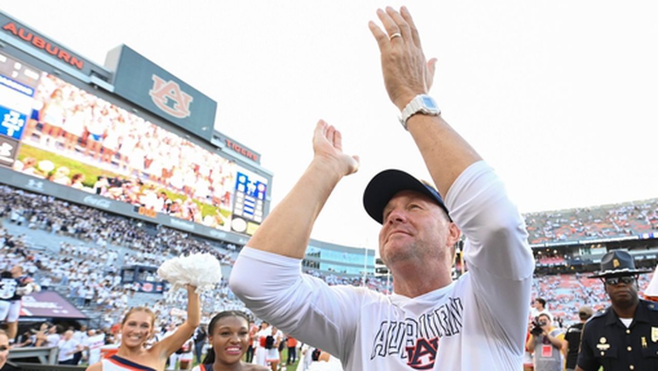 Watch as Hugh Freeze surprises Auburn player with football scholarship