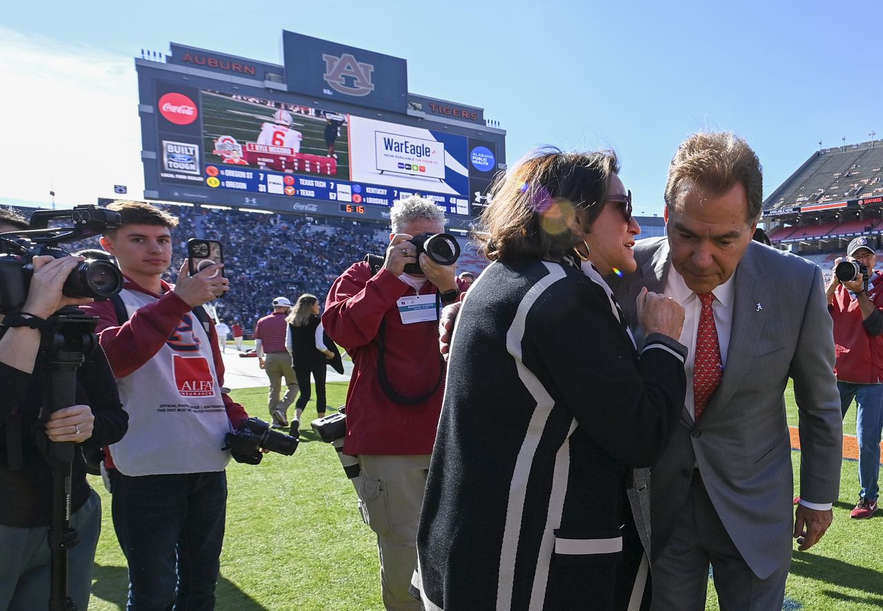 Watch Nick Saban arrive at Jordan-Hare, give Miss Terry kiss ahead of Iron Bowl