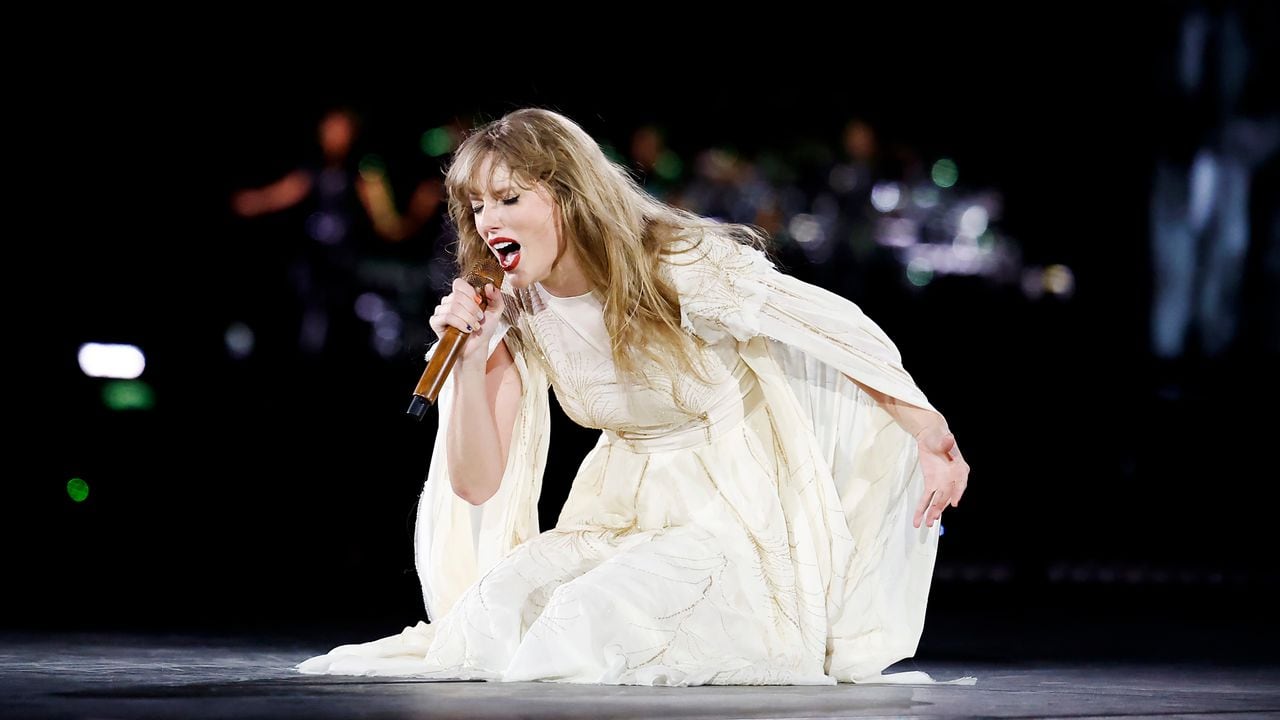 Watch Taylor Swift run to kiss Travis Kelce after adding him to song in Argentina concert