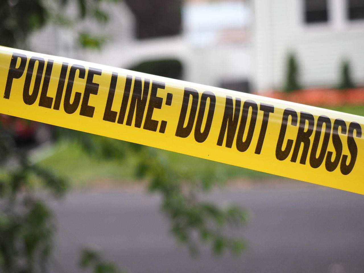 Mobile man thrown from car charged with murder of woman found shot to death inside wrecked vehicle