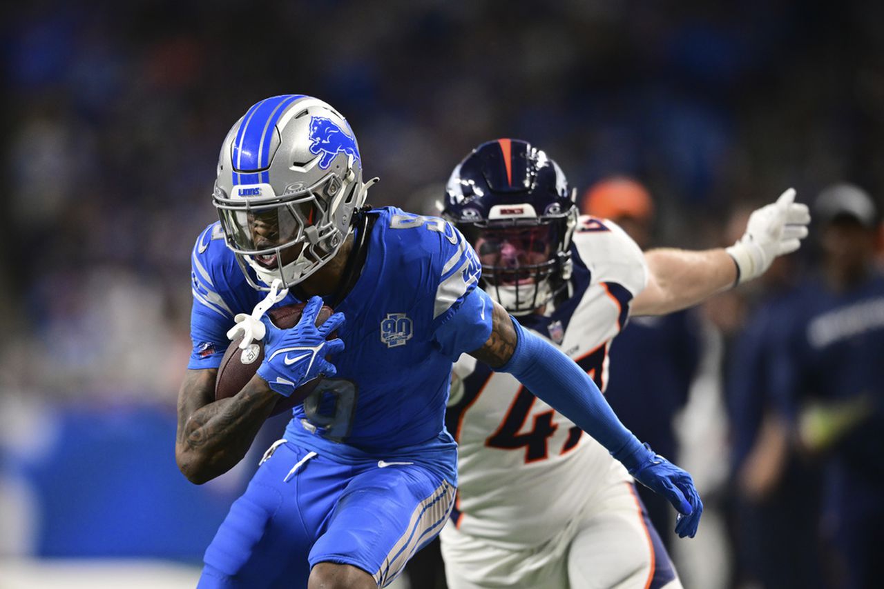 Detroit Lions wide receiver Jameson Williams runs after making a reception