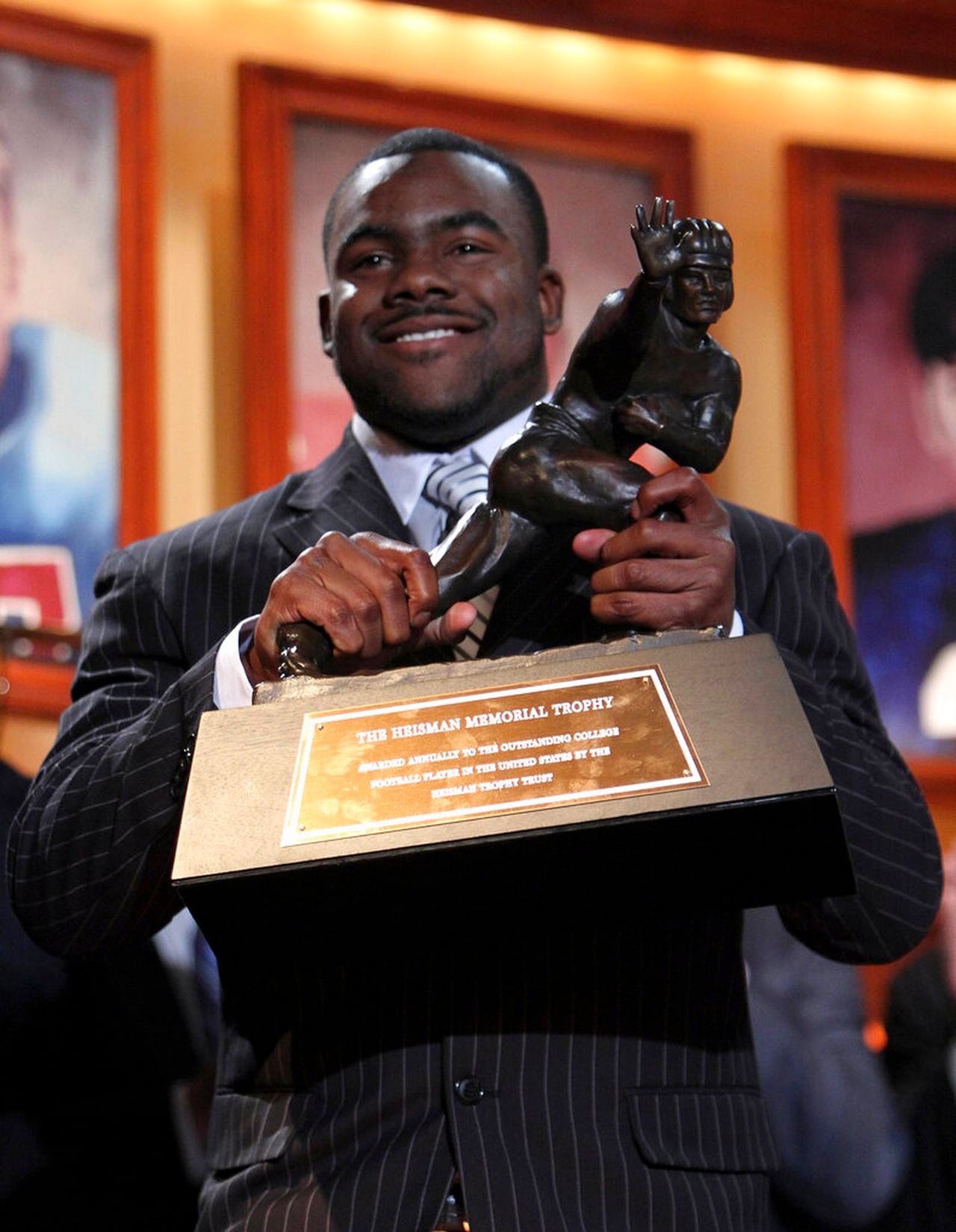 Alabama running back Mark Ingram holds up the Heisman Trophy on Dec. 12, 2009, in New York.