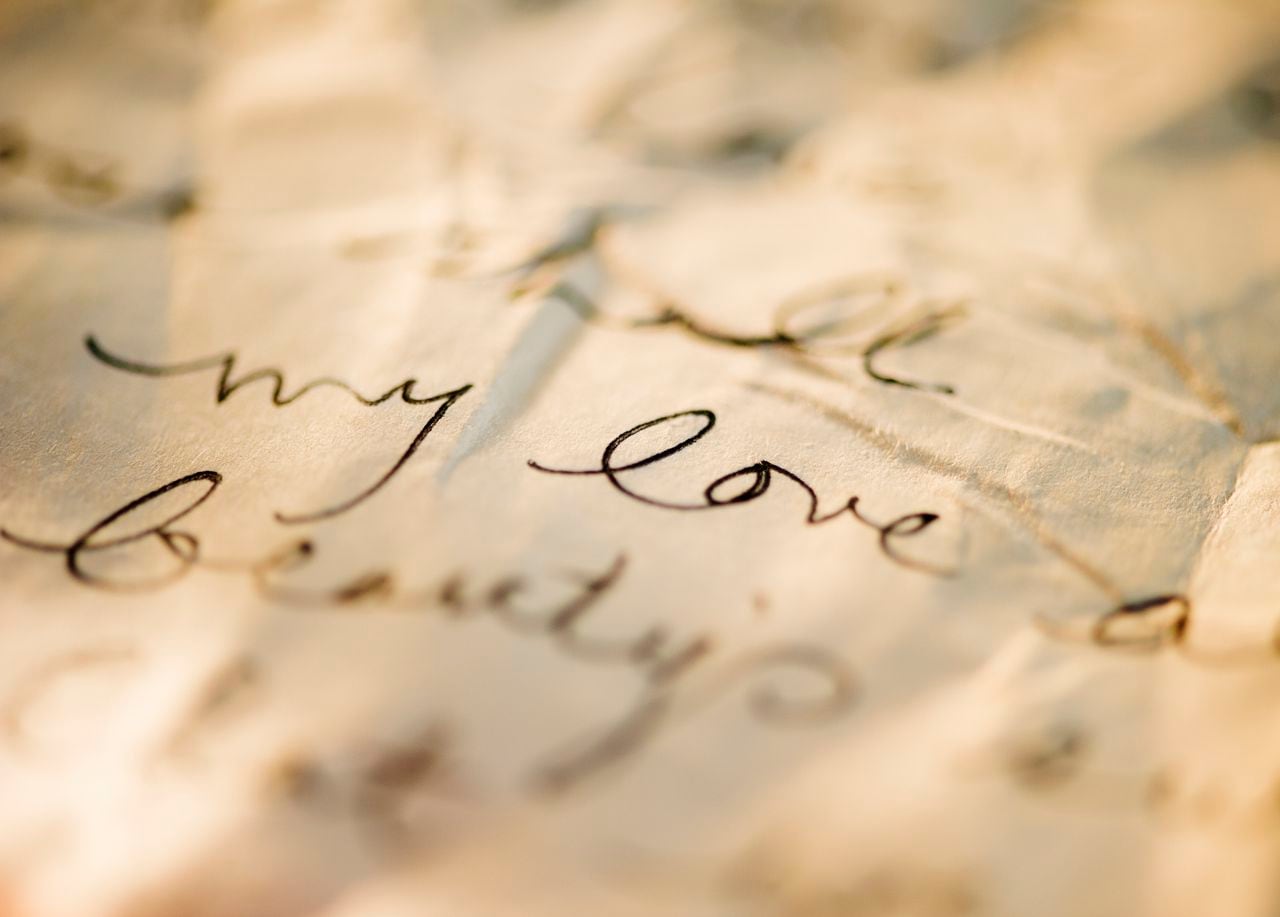 Close up of antique love letter on parchment 