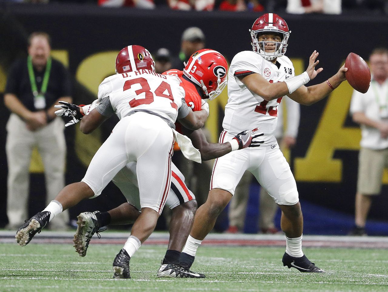Alabama quarterback Tua Tagovailoa passes against Georgia