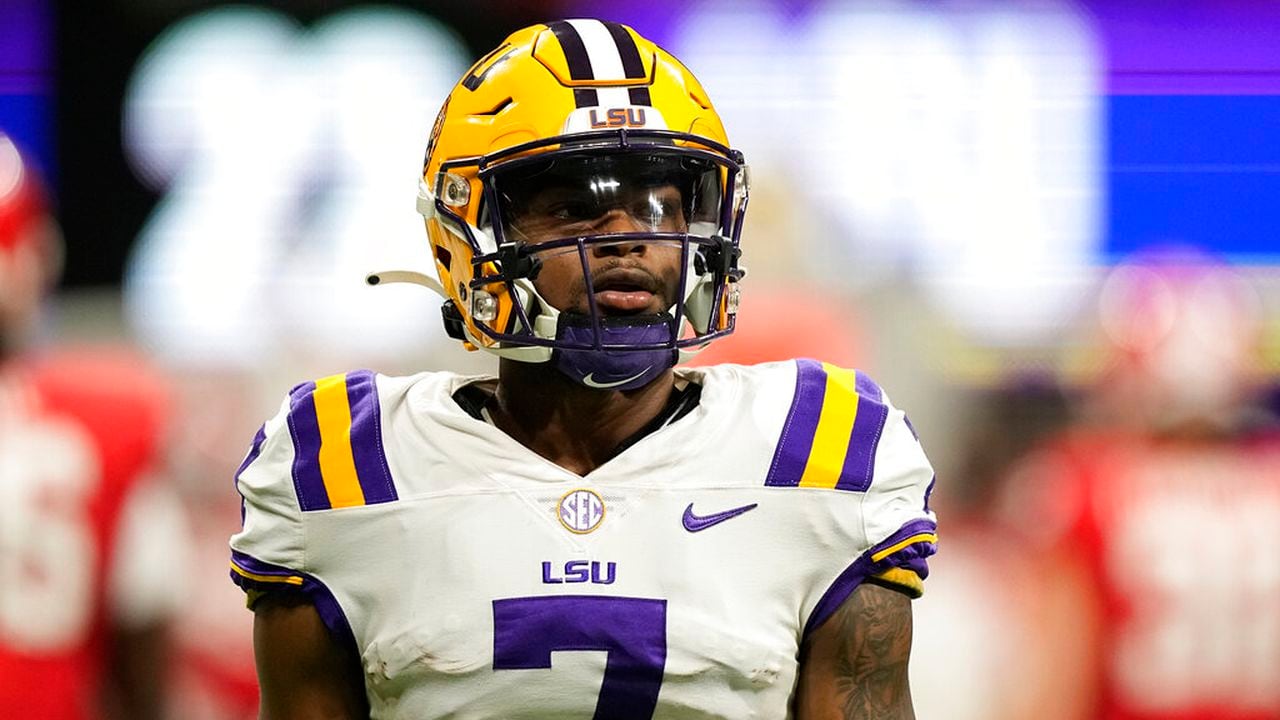 Ex-LSU football star arrested, charged in gambling probe