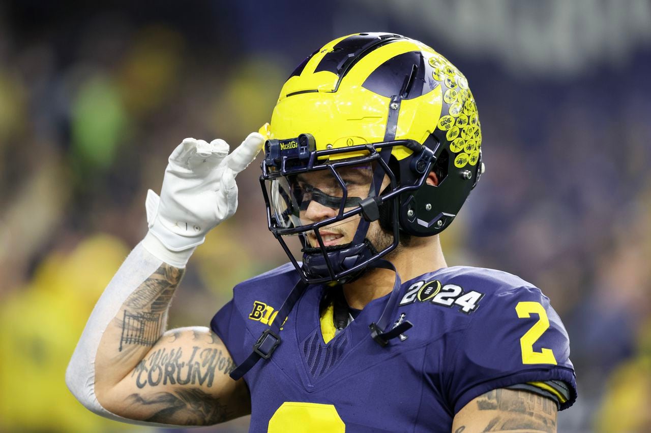 National champions! Michigan stuffs Washington, wins first title since 1997