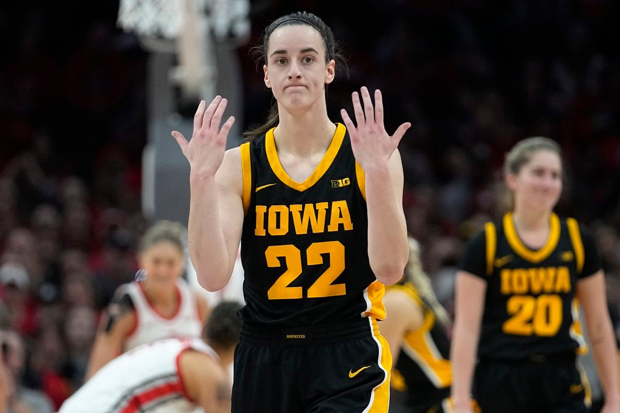 Watch Iowaâs Caitlin Clark injured after Ohio State fan collides with her while storming court