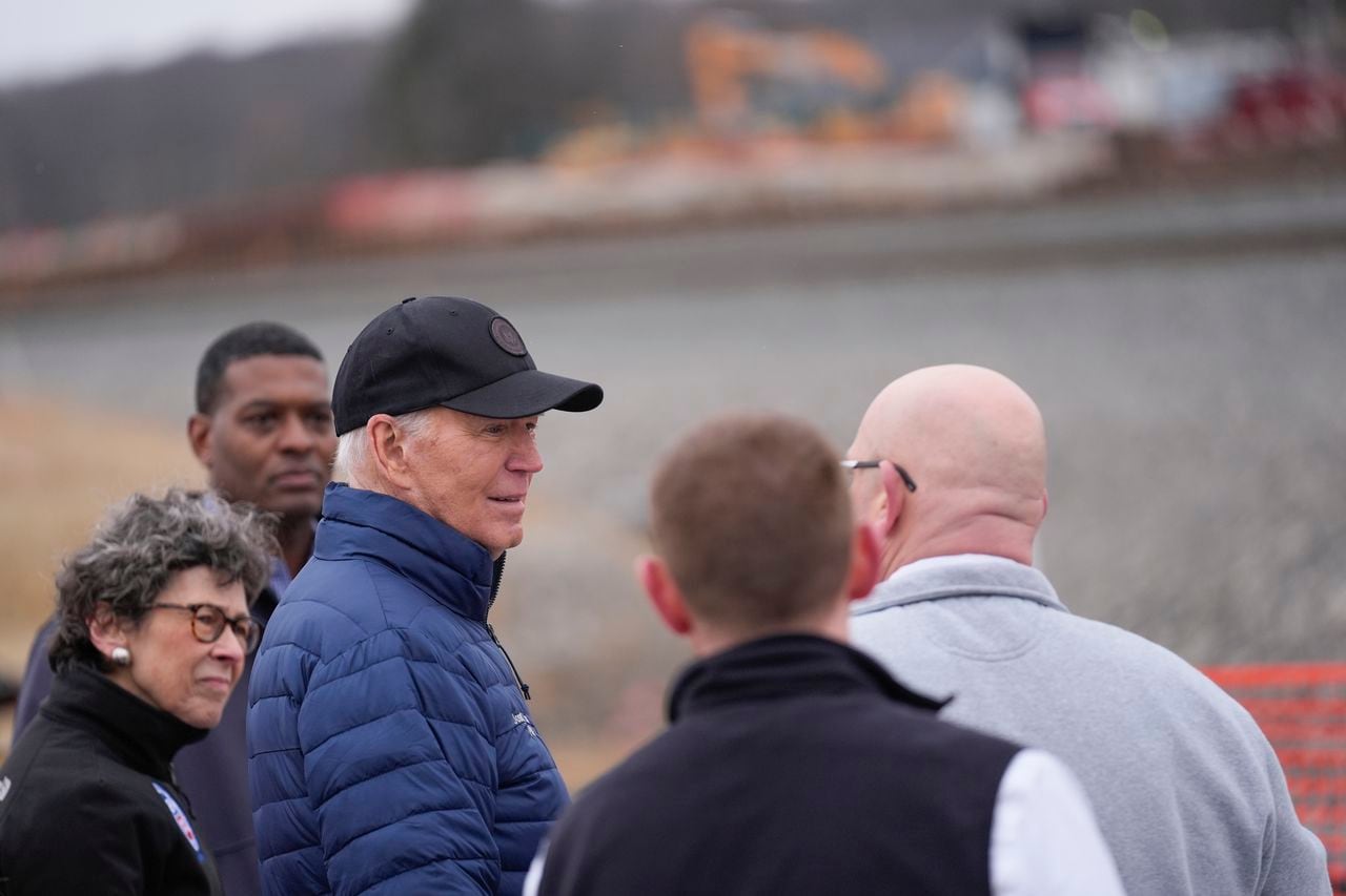 Biden praises 'Herculean efforts' to rebuild at the site of last February's Ohio train derailment